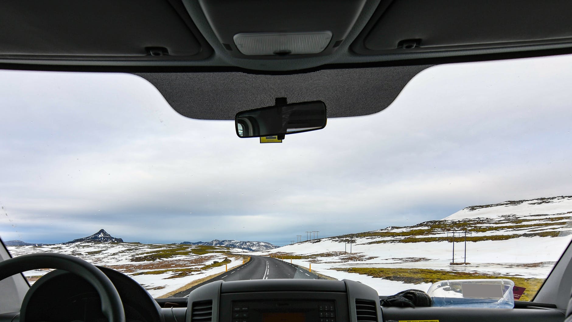 vehicle in between snow covered field