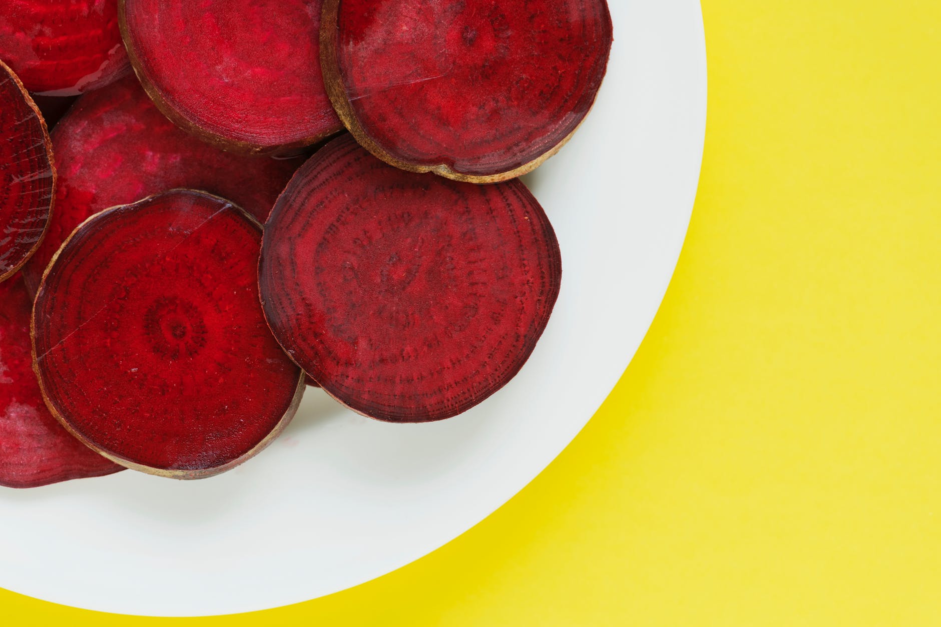 closeup photo of red beets on plate